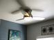 This dining area features a modern ceiling fan, decorative wall art, and a calming color scheme at 6480 Annie Oakley Dr # 111, Las Vegas, NV 89120
