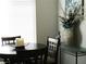 Bright dining area with natural light, stylish decor, and a tranquil setting for relaxing meals at 6480 Annie Oakley Dr # 111, Las Vegas, NV 89120