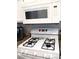 Close up of kitchen featuring a gas range and an over the range microwave oven at 6480 Annie Oakley Dr # 111, Las Vegas, NV 89120