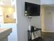 Cozy living room area with decorative wall art and a TV mounted on the wall at 6480 Annie Oakley Dr # 111, Las Vegas, NV 89120