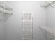 Spacious walk-in closet featuring multiple wire shelves, offering customizable storage solutions at 6480 Annie Oakley Dr # 111, Las Vegas, NV 89120