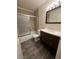 A modern bathroom includes an updated vanity, a tiled shower, and modern fixtures, offering a comfortable space at 6749 W Charleston Blvd # 2, Las Vegas, NV 89146