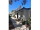 The exterior of the building features a well-maintained landscape and a sidewalk leading to the entrance at 6749 W Charleston Blvd # 2, Las Vegas, NV 89146