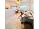 Cozy bedroom featuring a ceiling fan, window, and desk area for comfortable living at 7200 Alta Dr, Las Vegas, NV 89145