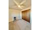 A simple bedroom with a ceiling fan, closet and neutral colors for a calming atmosphere at 7200 Alta Dr, Las Vegas, NV 89145