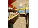 Well-lit kitchen featuring ample countertop space and modern appliances at 7200 Alta Dr, Las Vegas, NV 89145