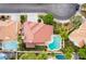 Overhead image of neighborhood with houses and landscaped yards, showing mature trees at 7632 Spruce Run Ct, Las Vegas, NV 89128