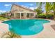 Inviting pool area, complete with a jacuzzi, an expansive deck, and shaded pergola, perfect for relaxation at 7632 Spruce Run Ct, Las Vegas, NV 89128