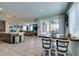 Bright dining area adjacent to the kitchen with sliding glass doors to the patio at 7821 Mazarine St, North Las Vegas, NV 89084