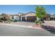 Charming single-story home with a two-car garage and well-maintained landscaping at 7821 Mazarine St, North Las Vegas, NV 89084