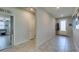 Bright entryway featuring tile floors and a view into the adjacent living area at 7821 Mazarine St, North Las Vegas, NV 89084