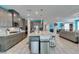 Spacious kitchen with stainless appliances, granite counters and large kitchen island at 7821 Mazarine St, North Las Vegas, NV 89084