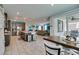 Spacious open floorplan combines kitchen, dining area, and living room for seamless entertaining at 7821 Mazarine St, North Las Vegas, NV 89084