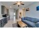 Open living area with kitchenette, seating, and views to the bathroom at 7821 Mazarine St, North Las Vegas, NV 89084