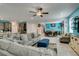 Spacious living room flowing into the kitchen and dining area, perfect for gatherings at 7821 Mazarine St, North Las Vegas, NV 89084