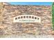 Rosecrest at Elkhorn Springs community sign featuring a stone wall and clear blue sky at 8120 Backpacker Ct, Las Vegas, NV 89131