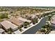 Birds eye view of planned community with tree-lined streets and desert landscaping at 8180 Loma Del Ray St, Las Vegas, NV 89131