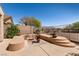 Backyard featuring desert landscape with mature trees at 8180 Loma Del Ray St, Las Vegas, NV 89131