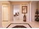 Open foyer with decorative tile flooring and views into living areas at 8180 Loma Del Ray St, Las Vegas, NV 89131