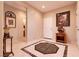 Entryway featuring decorative tile flooring, neutral wall paint and decorative accents at 8180 Loma Del Ray St, Las Vegas, NV 89131