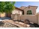 Attractive front entry featuring an ornate gate, walkway and desert landscaping elements at 8180 Loma Del Ray St, Las Vegas, NV 89131