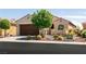 Charming single-story home with desert landscaping, covered entrance and two car garage at 8180 Loma Del Ray St, Las Vegas, NV 89131