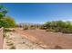 Expansive desert landscape with trees and mountain views at 8180 Loma Del Ray St, Las Vegas, NV 89131
