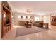 Spacious living room with neutral tones, fireplace, and comfortable seating at 8180 Loma Del Ray St, Las Vegas, NV 89131