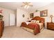 Inviting bedroom with a cozy bed, neutral tones, and complementary furnishings at 8180 Loma Del Ray St, Las Vegas, NV 89131