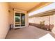 Covered patio with a sliding glass door and view of the backyard at 8180 Loma Del Ray St, Las Vegas, NV 89131