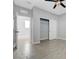 Bedroom featuring wood-look floors and closet with sliding doors at 8349 Pollenzo Ave, Las Vegas, NV 89178