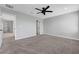 A spacious bedroom with neutral walls and plush carpeting at 8349 Pollenzo Ave, Las Vegas, NV 89178