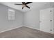 Bedroom with carpet, ceiling fan, and neutral paint at 8349 Pollenzo Ave, Las Vegas, NV 89178
