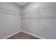 Walk-in closet with wire shelving and plush carpeting at 8349 Pollenzo Ave, Las Vegas, NV 89178