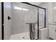 Contemporary bathroom featuring a sleek glass-enclosed shower and modern fixtures at 8349 Pollenzo Ave, Las Vegas, NV 89178