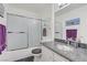 Bathroom featuring a shower-tub combo, marble countertop, and neutral decor at 8410 Eldora Ave # 2082, Las Vegas, NV 89117