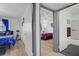 Bedroom views from hallway with neutral decor and an adjoining bathroom at 8410 Eldora Ave # 2082, Las Vegas, NV 89117