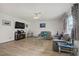 Bright living room with modern sofas with bright pillows, laminate wood floors and contemporary decor at 8410 Eldora Ave # 2082, Las Vegas, NV 89117