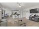 Open floor plan with a modern living room connected to a well-equipped kitchen and dining area at 8410 Eldora Ave # 2082, Las Vegas, NV 89117