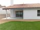 The backyard has artificial turf and concrete at 8640 Portofino Ct, Las Vegas, NV 89117