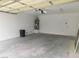 Clean garage providing ample space for parking and storage at 8640 Portofino Ct, Las Vegas, NV 89117