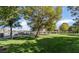 Community park with green space and walking paths near water at 8640 Portofino Ct, Las Vegas, NV 89117