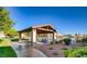 Community picnic area with tables, shelter, and lake views at 8640 Portofino Ct, Las Vegas, NV 89117