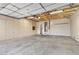 Spacious garage with built-in storage cabinets and concrete flooring at 884 Adobe Flat Dr, Henderson, NV 89011