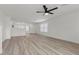 Open-concept living room with contemporary finishes, new flooring, and ample space for entertaining at 884 Adobe Flat Dr, Henderson, NV 89011