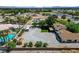 Expansive property with a pool, large parking area, mature trees, and a single-story home at 8970 W Lone Mountain Rd, Las Vegas, NV 89129
