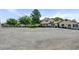 Expansive backyard with a large gravel area, lush lawn, and covered patio perfect for entertaining and relaxation at 8970 W Lone Mountain Rd, Las Vegas, NV 89129