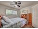 Inviting bedroom with a comfortable bed, window, and storage, designed for relaxation and restful nights at 8970 W Lone Mountain Rd, Las Vegas, NV 89129