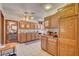 Spacious kitchen featuring tile flooring, neutral cabinets and lots of counterspace at 8970 W Lone Mountain Rd, Las Vegas, NV 89129