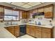 Kitchen showcasing wood cabinets, countertops and stainless appliances at 8970 W Lone Mountain Rd, Las Vegas, NV 89129